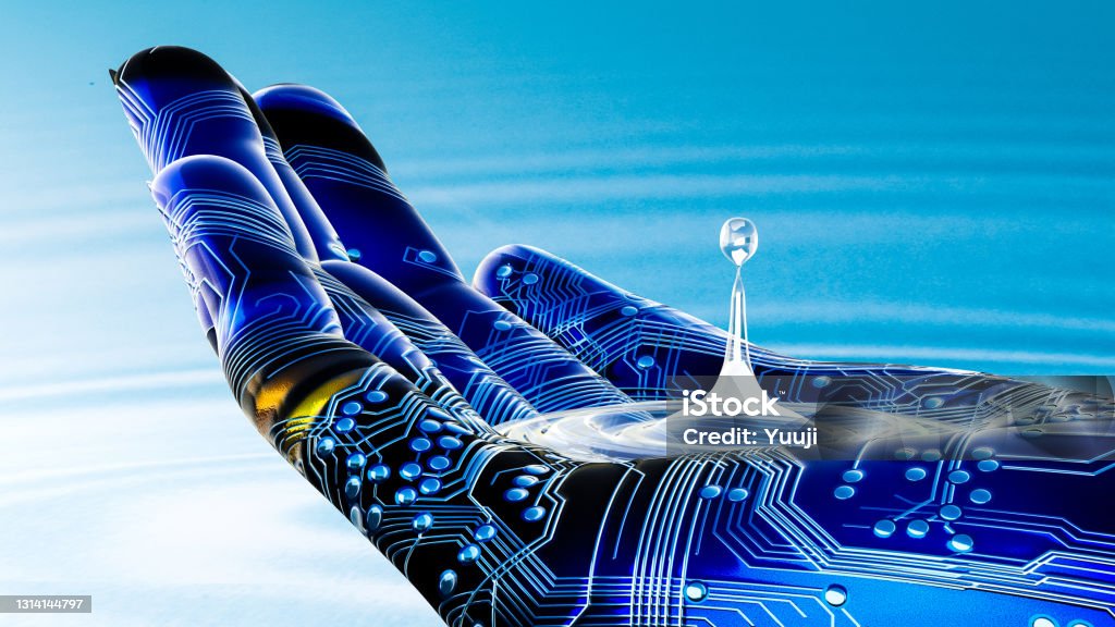 A robot's hand that scoops up safe and clean water. Create clean and safe water with AI and technology to eliminate water shortages. Artificial Intelligence Stock Photo