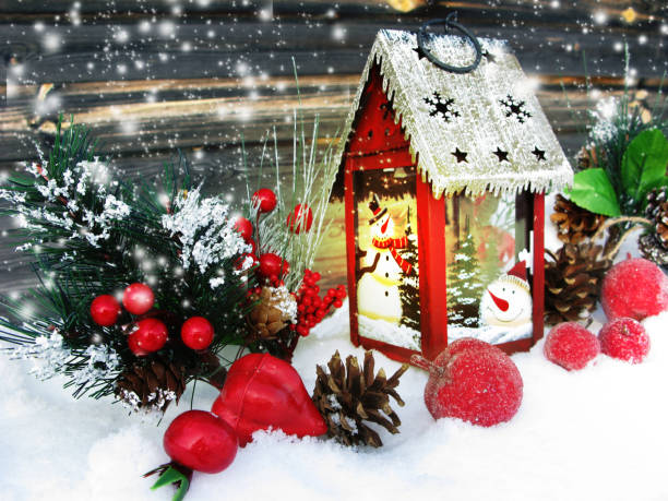istock christmas lantern fruit berries apple and decoration with fir branches snow 1314145006