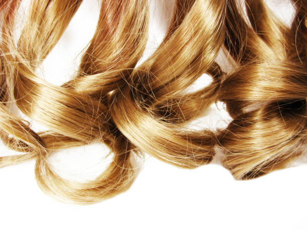 istock blond curly highlight hair texture abstract fashion style background 1314148372