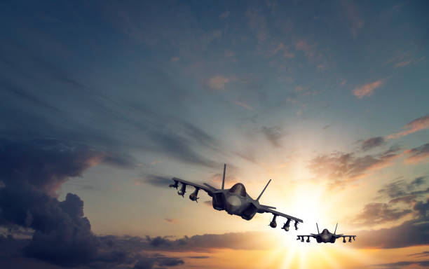 istock Jet aircrafts flying over the clouds. 1314149441