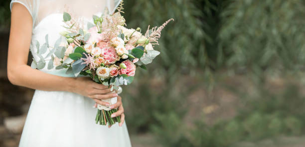 istock The bride holds a wedding bouquet 1314151112