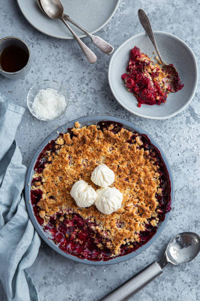 istock cherry crumble pie with vanilla ice cream 1314154585