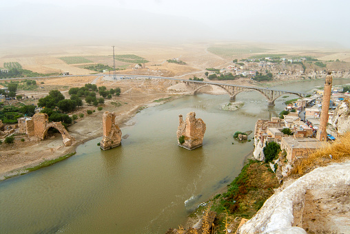 Hasankeyf ancient city, historical bridge and Tigris(Dicle) river view.Hasankeyf ancient city was flooded by the İlisu dam in 2020
