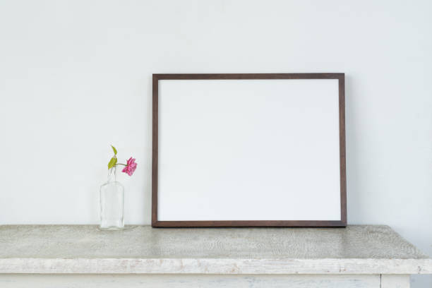 istock Picture frame and vase flowers 1314154771