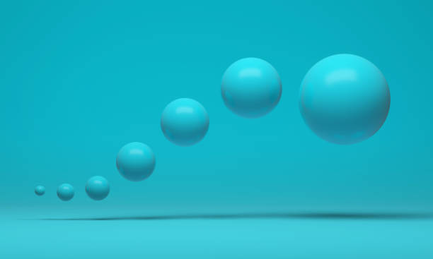 istock A group of floating turquoise spheres arranged in a curved line on a turquoise background. 3d rendering 1314154900
