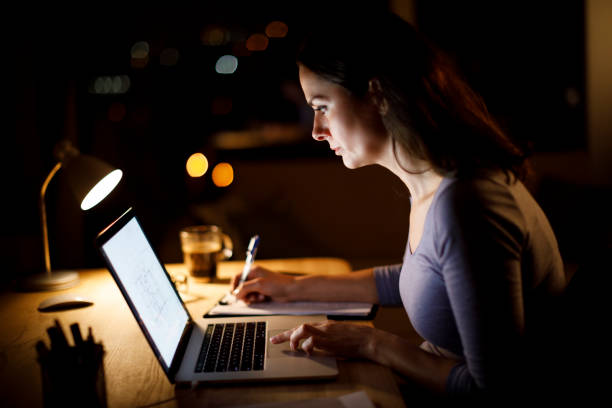 istock Woman working late at home 1314157472