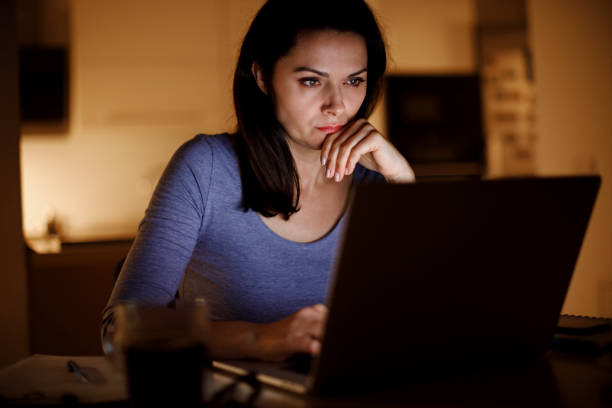 istock Mature woman working late at home 1314157493