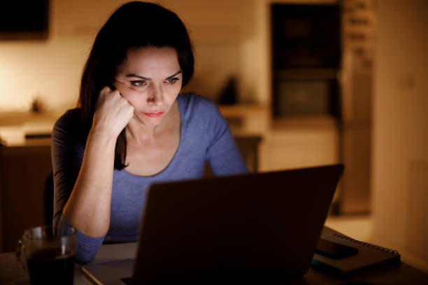 istock Mature woman working late at home 1314157810