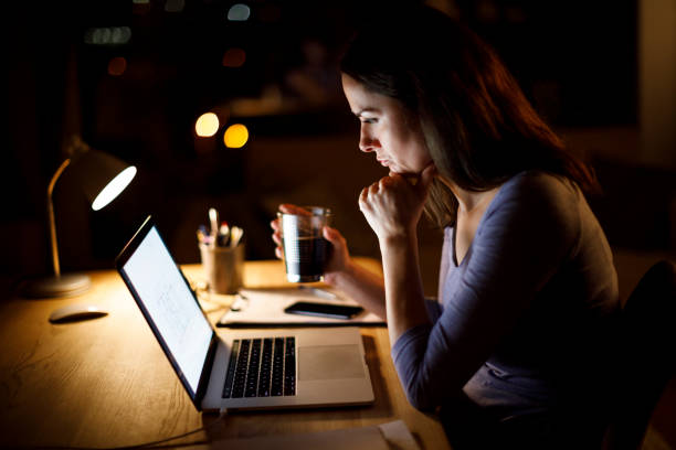 istock Mature woman working late at home 1314158367