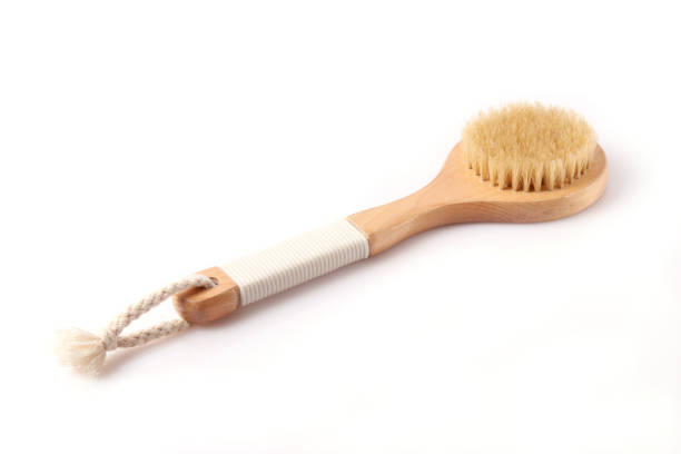 istock brush for dry massage on a white background isolated. 1314159807