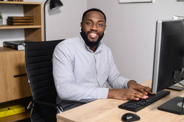 istock An intelligent African guy in shirt indoor 1314161049