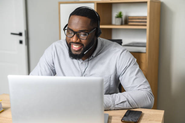 istock African-American worker live streaming webinar 1314161319