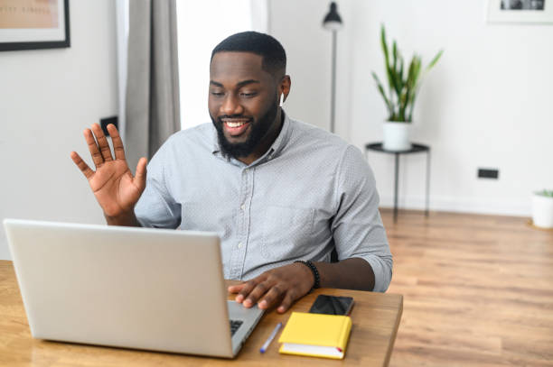 istock Smiling African American guy on video conference 1314161897