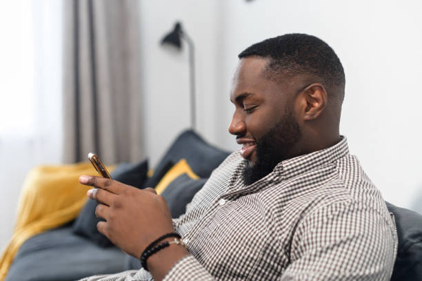 istock Millennial African American man typing a message 1314162041