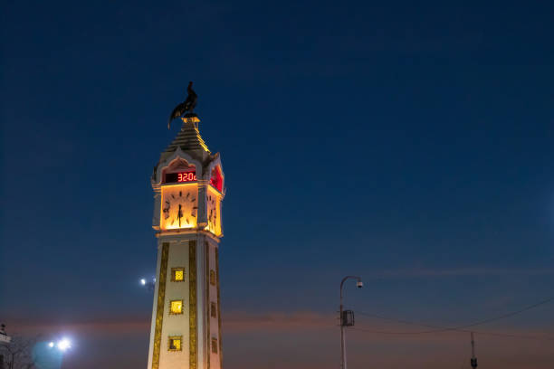 nonthaburi clock tower with beautiful twilight sky; the clock tower stands tall and proud as it serves the people by making them value time each day. this big clock is landmark in nonthaburi. - concepts and ideas travel locations architecture and buildings time imagens e fotografias de stock