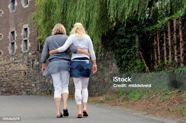 Mother And Daughter Stock Photo - Download Image Now - Arm Around, Shoulder, Bonding