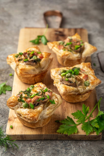 savory puff muffins with ham, mushroom and   vegetables