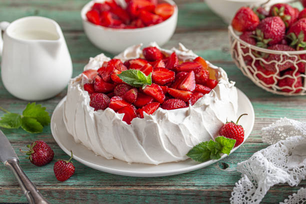 delicious Pavlova cake with fresh strawberry stock photo