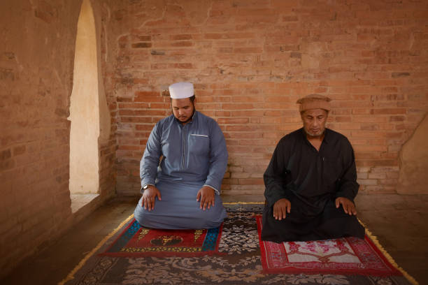 istock Muslim man is praying at an old mosque in Thailand. 1314165533