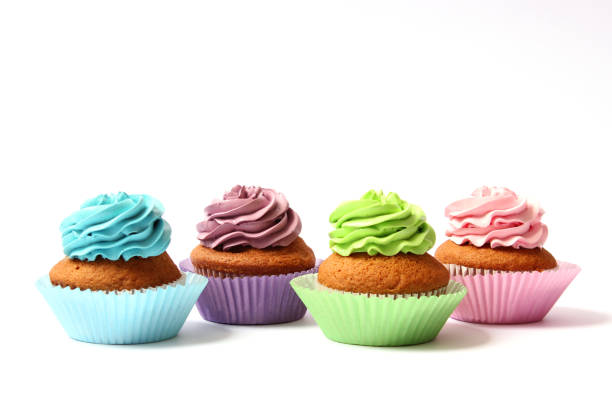 istock tasty cupcakes on a white background. 1314166868