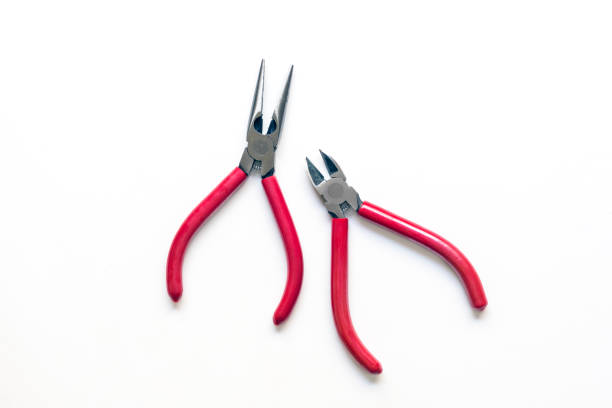 Cutter and pliers isolated on a white background