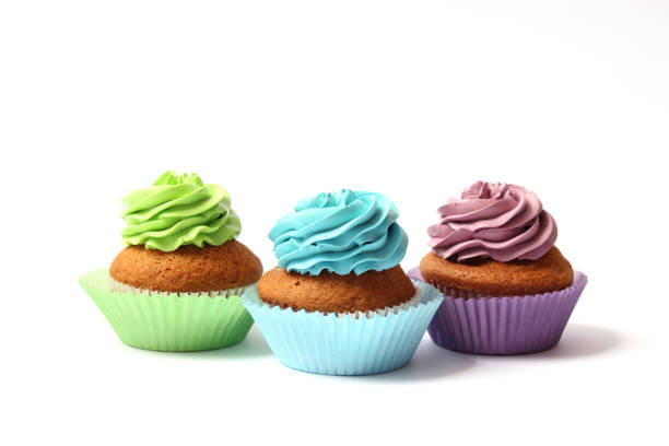 istock tasty cupcakes on a white background. 1314167120