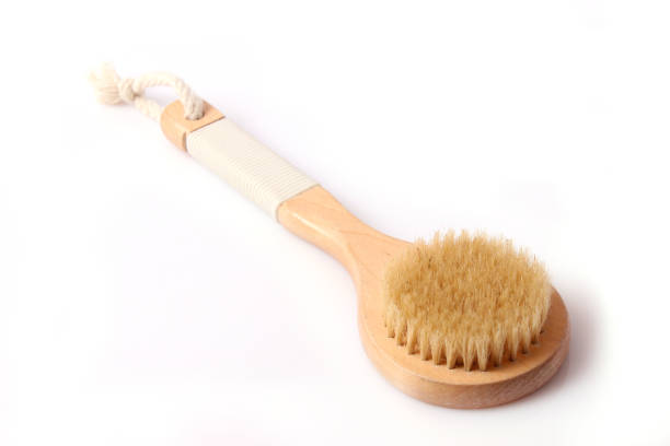istock brush for dry massage on a white background isolated. 1314171028