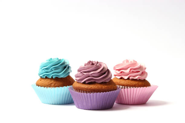 istock tasty cupcakes on a white background. 1314173514