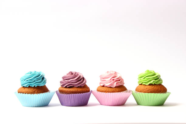 istock tasty cupcakes on a white background. 1314176872