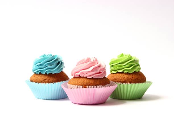 istock tasty cupcakes on a white background. 1314177864