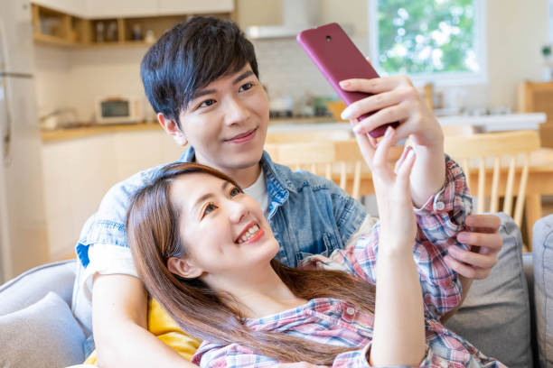 istock asian couple take selfie 1314178045