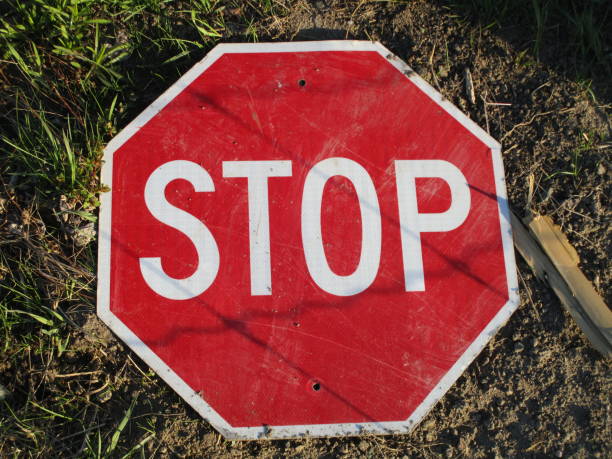 istock Stop Sign on the Ground 1314178119