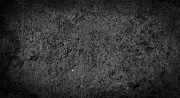 istock macro photo of black brick with visible texture. background 1314187493