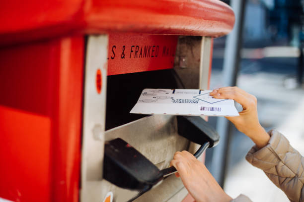istock Throwing covid-19 home test to royal mail box 1314194545