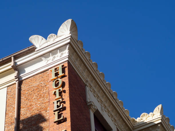 istock Modernist hotel lettering with red brick wall 1314197241