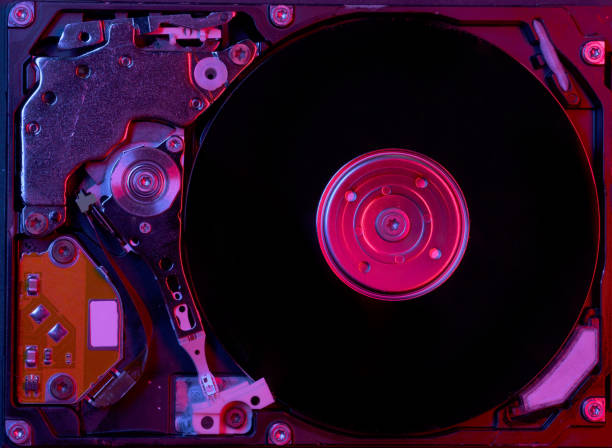 istock Close up view of a computer hard drive with red-blue lighting 1314200456
