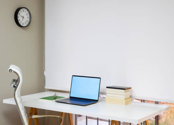 istock Home office with computer desk in living room, daylight shot 1314202829