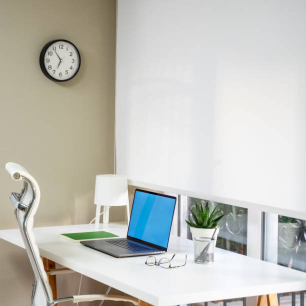 istock Home office with computer desk in living room, daylight shot 1314202842