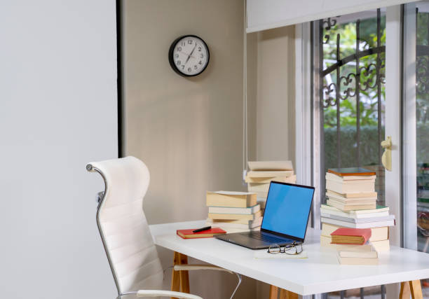 istock Home office with computer desk in living room, daylight shot 1314202843