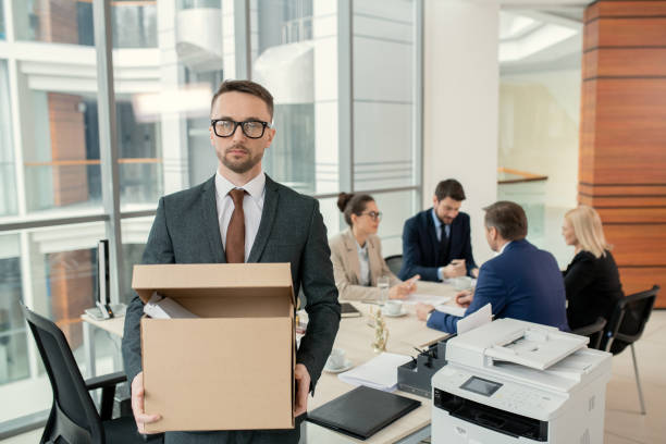 istock Young lawyer with stuff leaving office 1314203296
