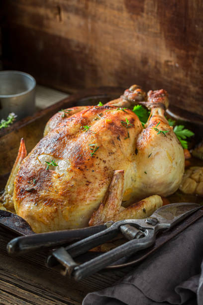 istock Grilled chicken with herbs and vegetables. Roasted chicken with herbs. 1314203425
