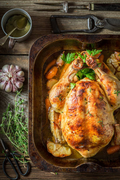 istock Grilled chicken with vegetables and herbs. Roasted chicken with herbs. 1314205406