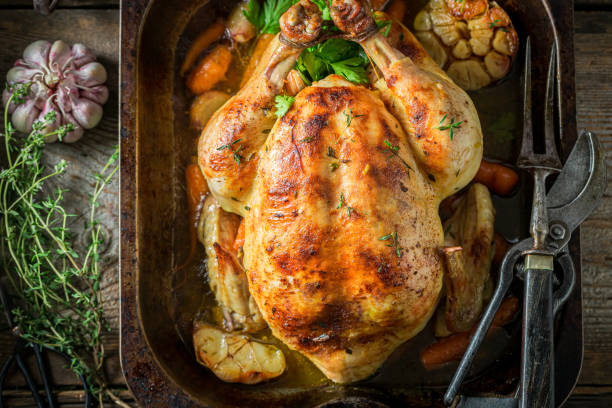 istock Grilled chicken with thyme and garlic. Roasted chicken with herbs. 1314205770
