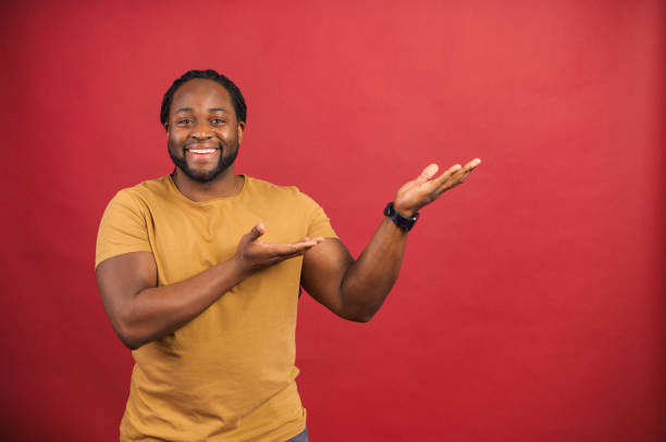 istock African American man pointing on the blank space 1314205871