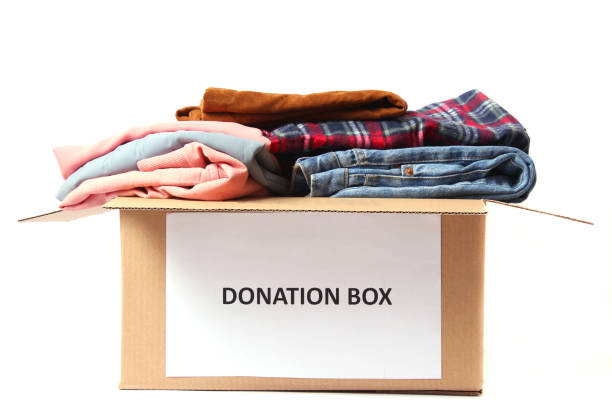 istock donation box with clothes isolated on white 1314207047
