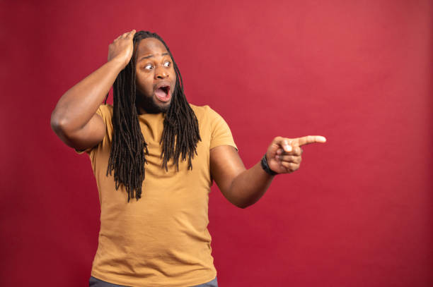 istock African American man pointing on the blank space 1314207055