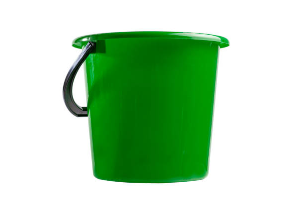 istock Green plastic bucket on white isolated, closeup. 1314207068