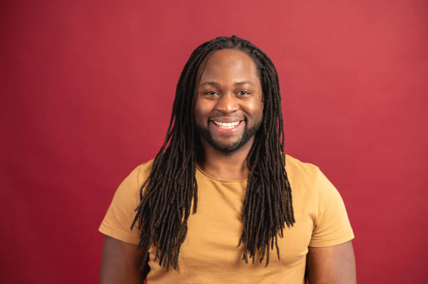 istock Smiling young African American with dreadlocks 1314207704
