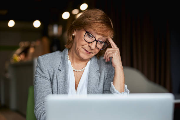 istock Concentrated mature woman being deep in thoughts 1314211443