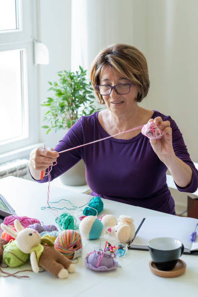 istock Senior woman working from home 1314216042